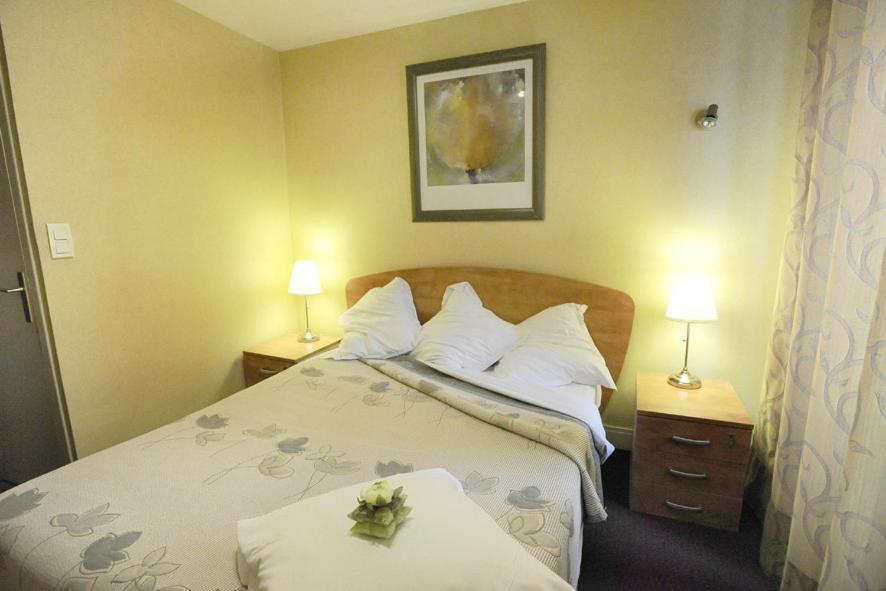 Les Negociants Hotel Pontgibaud Værelse billede